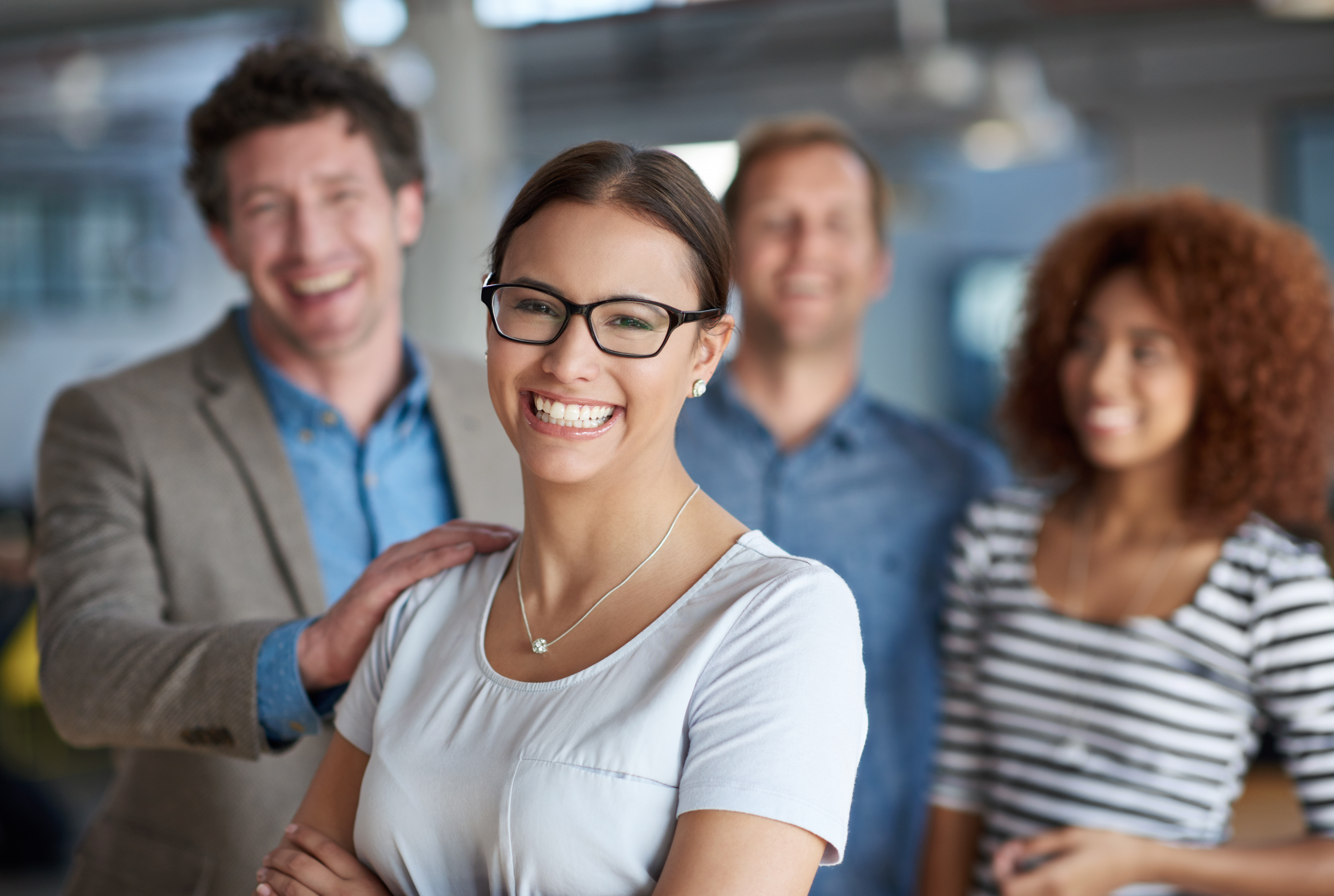 Happy employee looking at equity dashboard on laptop or phone